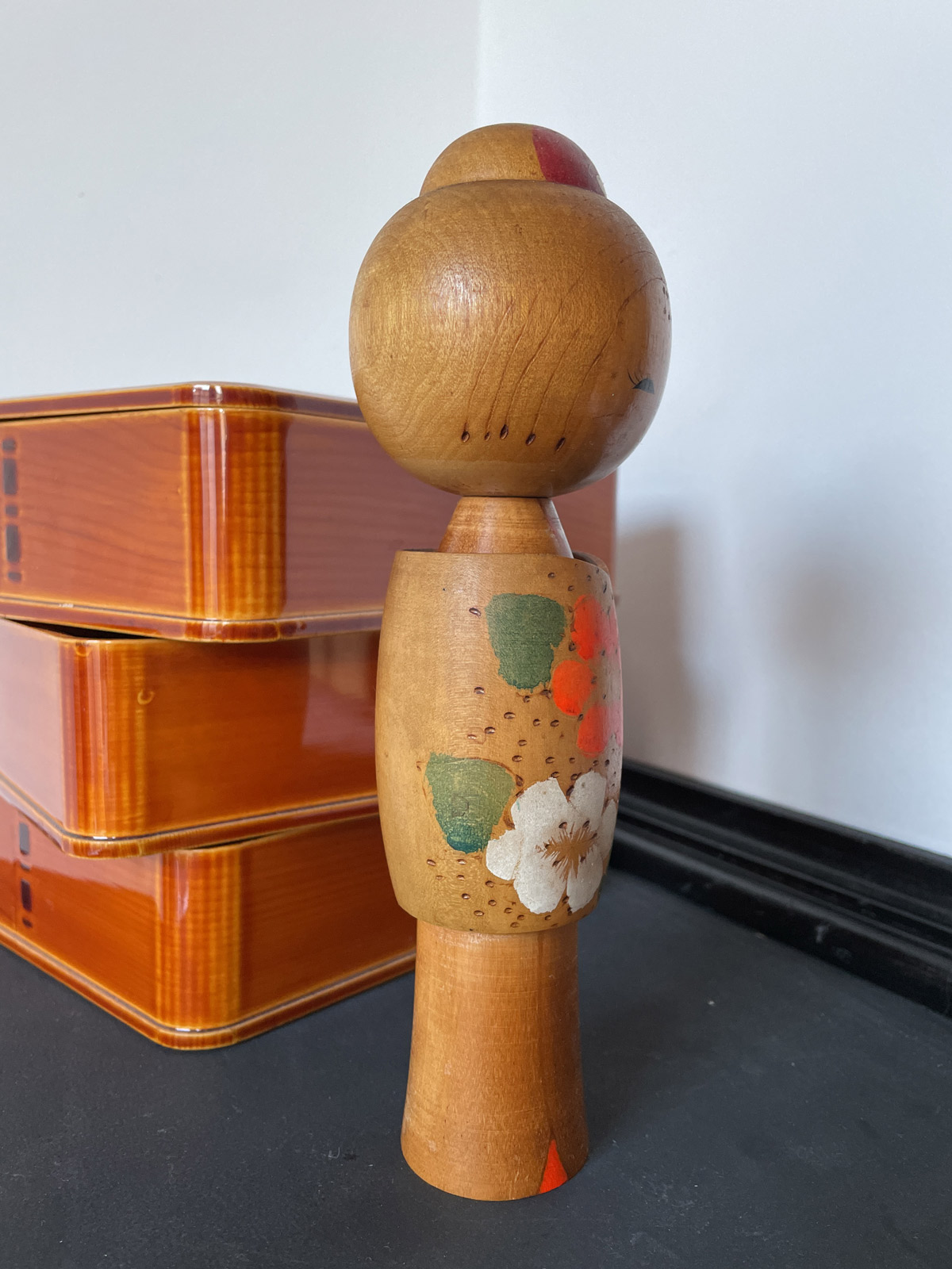 Vintage creative kokeshi with bright flowers