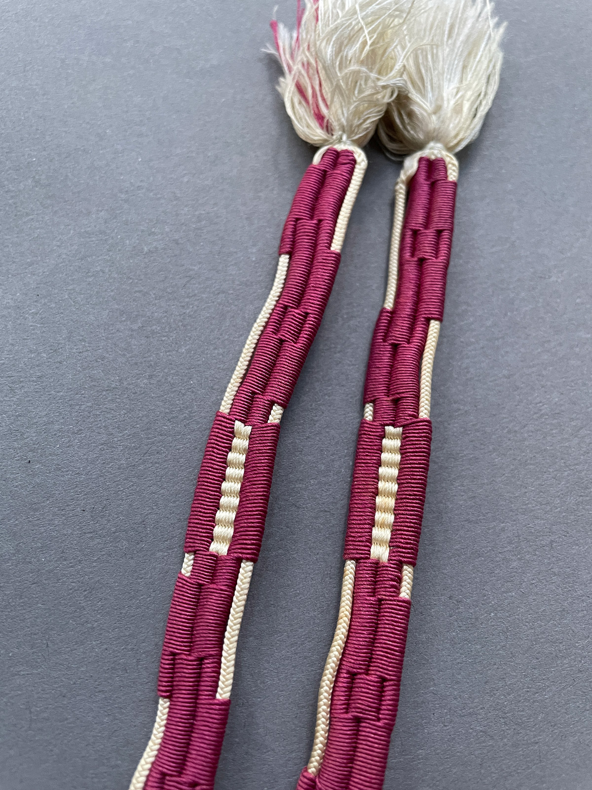 Refined woven silk obijime cord in wine red and beige