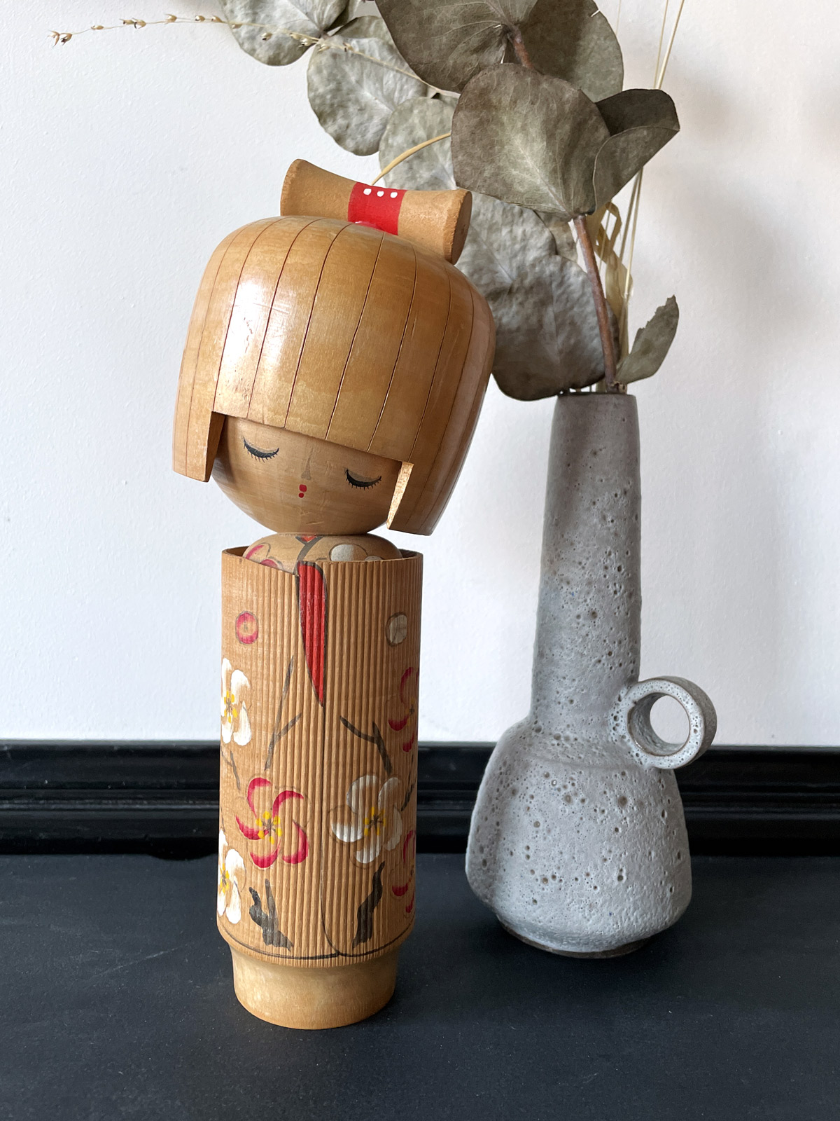 Vintage handmade kokeshi doll by Tanaka Kojo