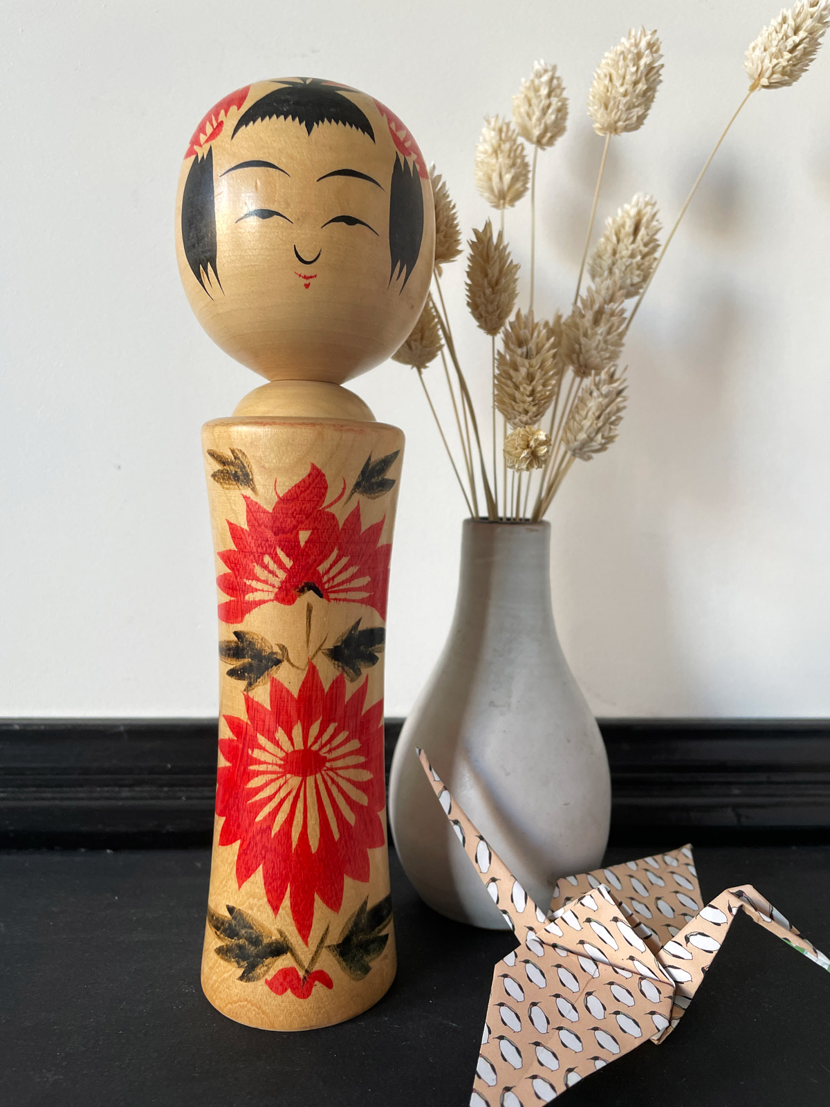 Traditional wooden Kokeshi doll in Narugo style