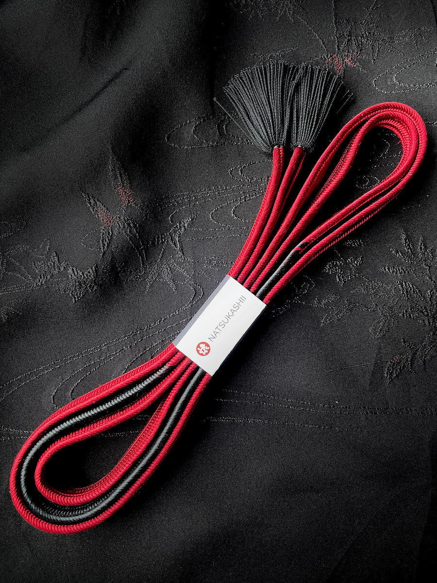 Vintage handmade cord in dark red and black