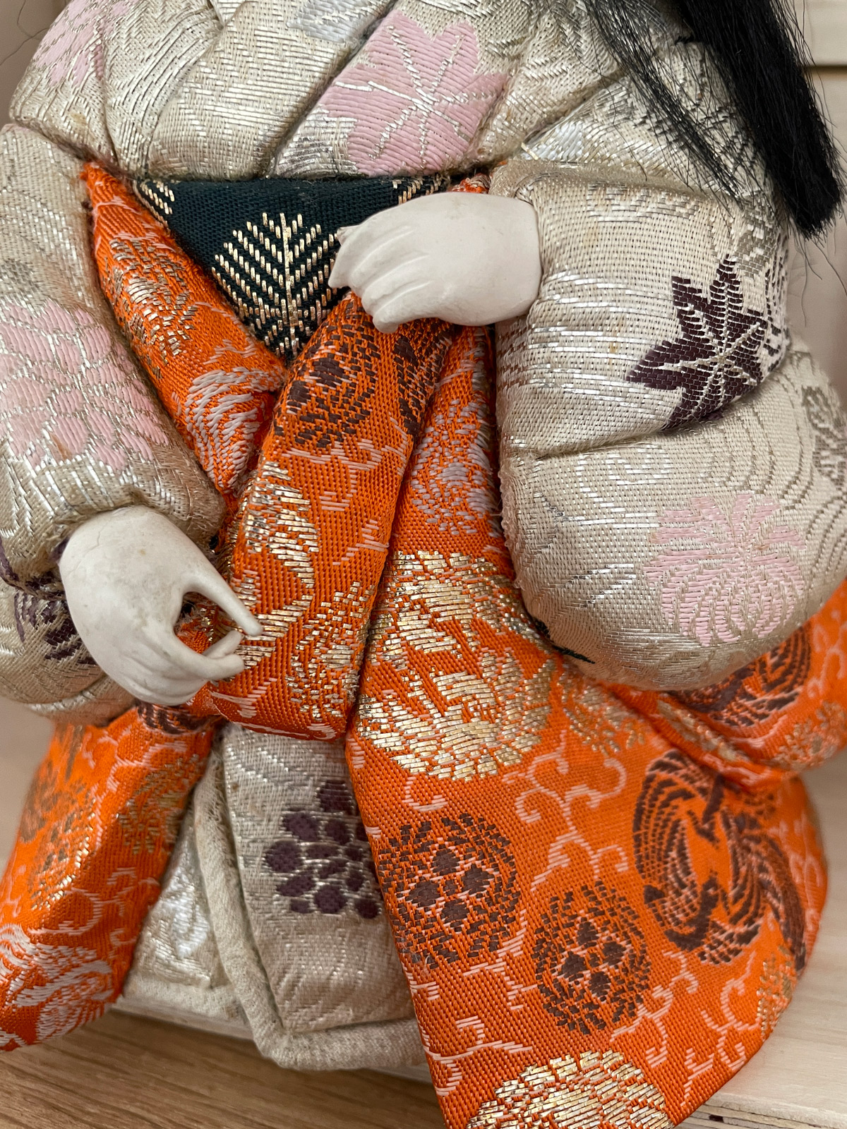 Vintage Kimekomi doll wearing beautifully decorated Kimono