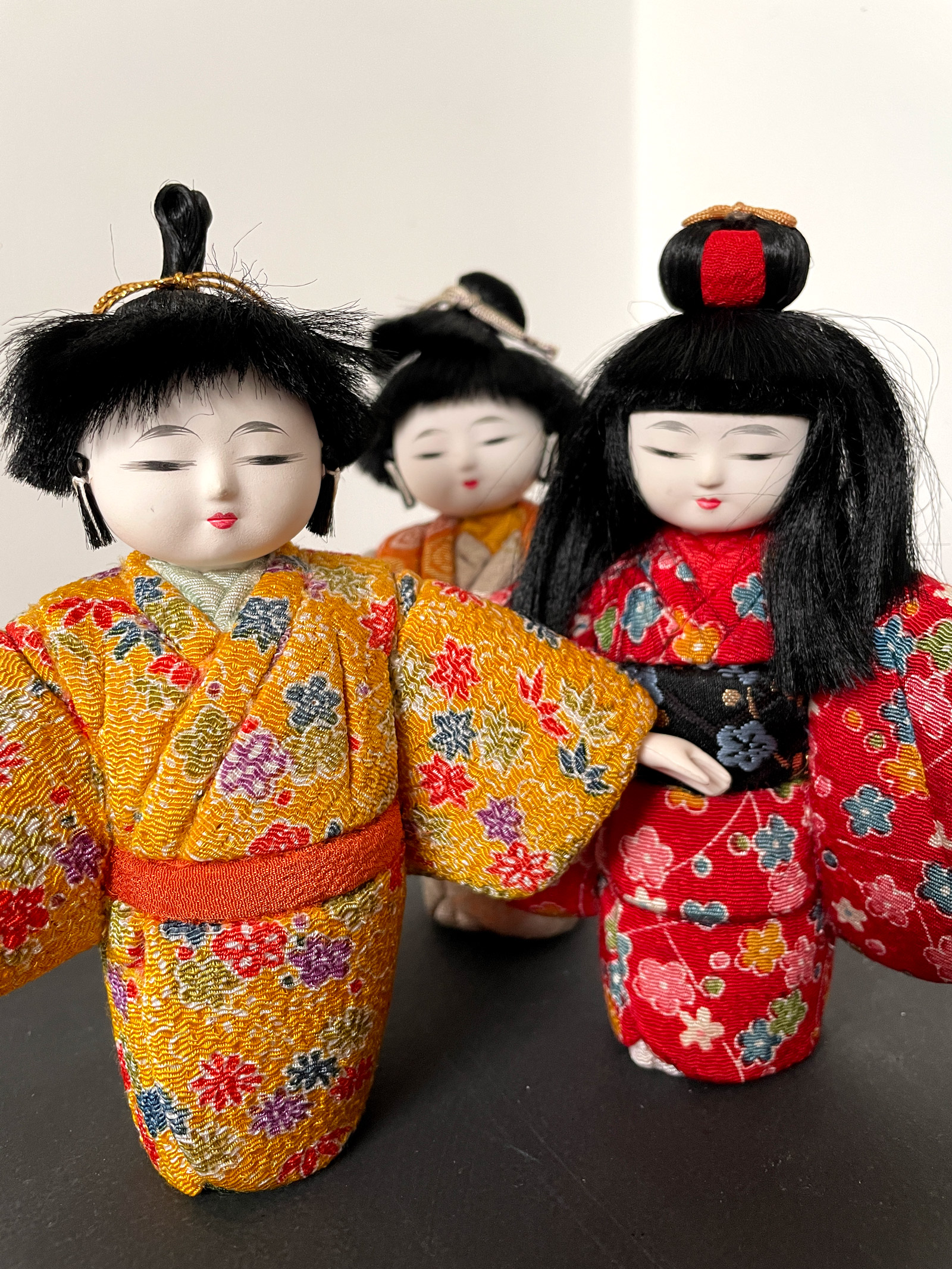 Three cute Kimekomi dolls in silk Kimono