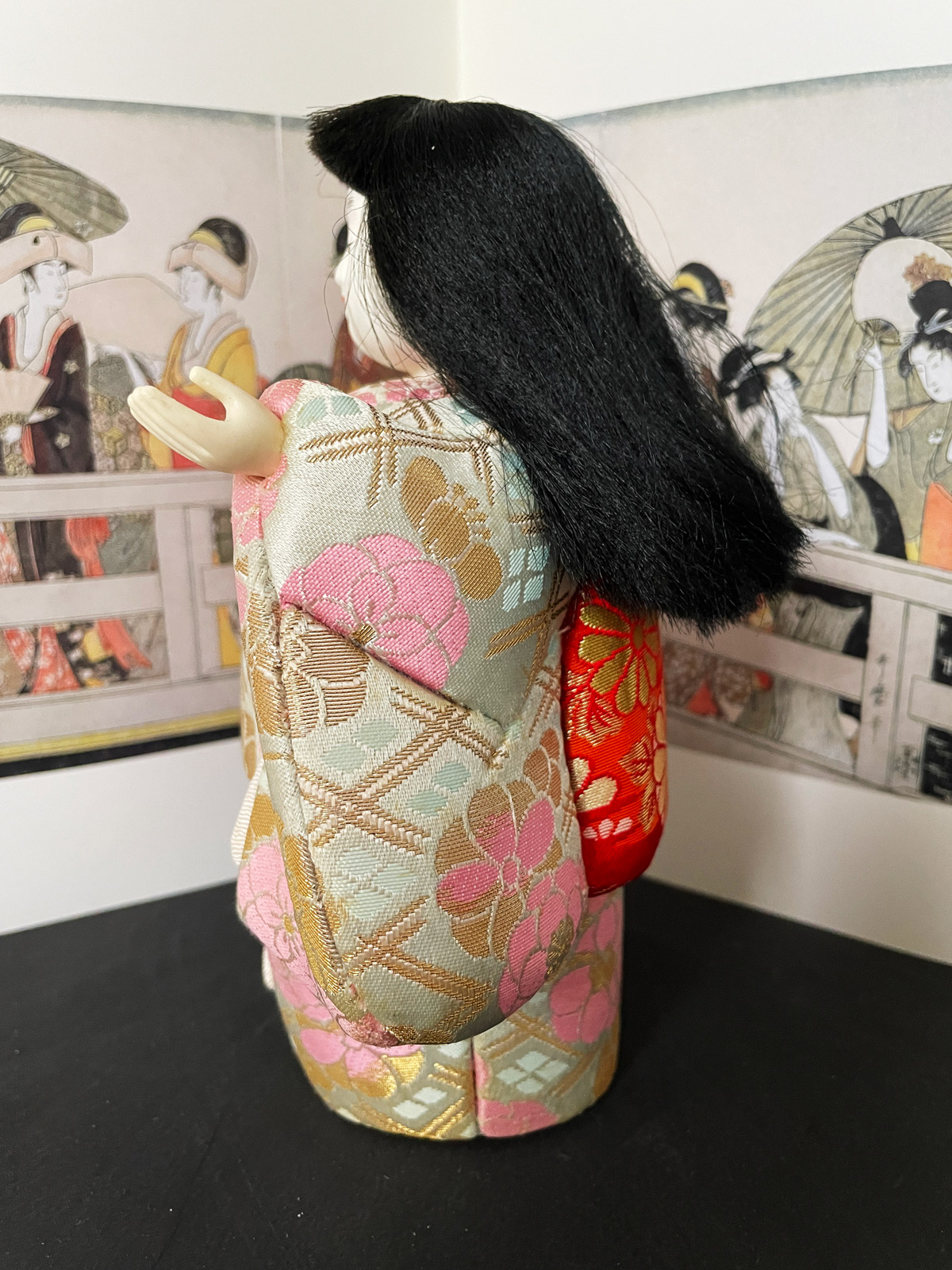 Vintage Kimekomi doll in silk kimono with pink flowers