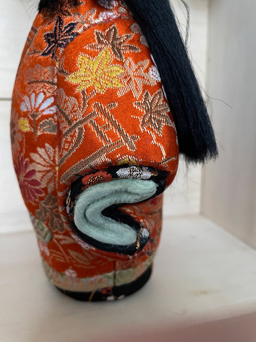 Vintage handcrafted Kimekomi doll girl in silk kimono Japan