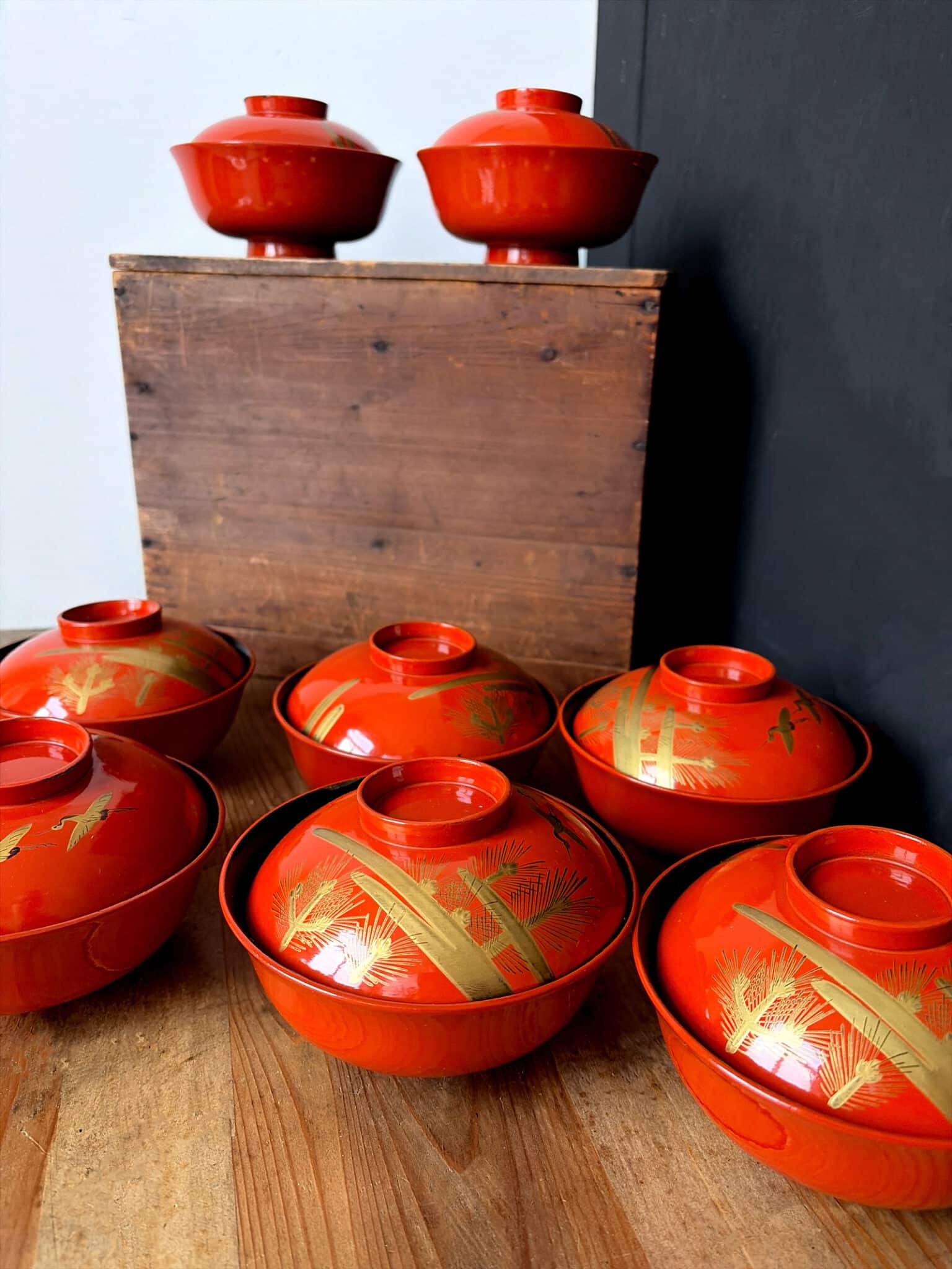 Antique red Urushi lacquerware bowls with gold hand-painted design