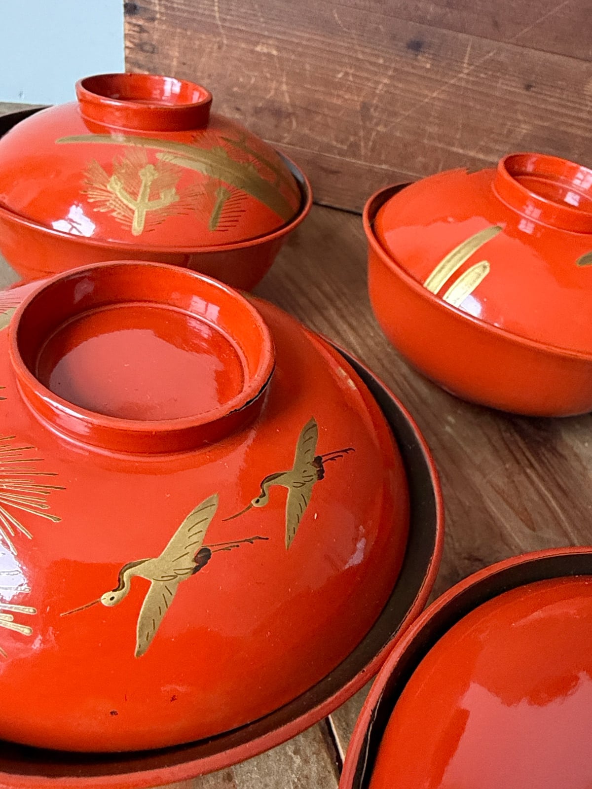 Antique red Urushi lacquerware bowls with gold hand-painted design