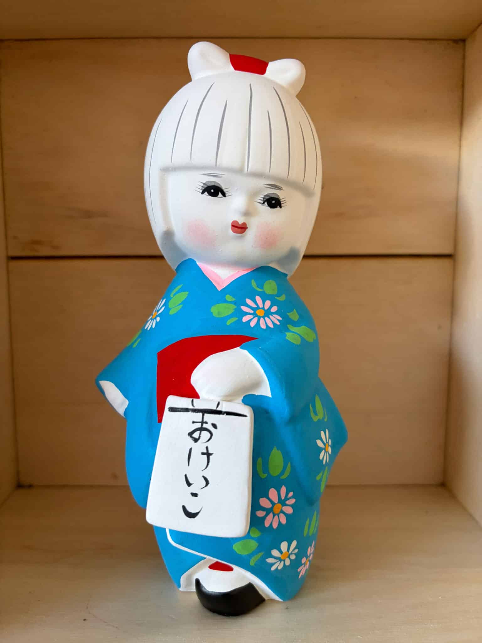 Hakata doll – Girl in blue Kimono